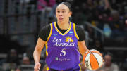 LA Sparks forward Dearica Hamby (5) dribbles the ball.