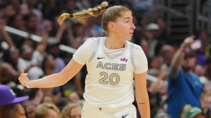 Jul 5, 2024; Los Angeles, California, USA; Las Vegas Aces guard Kate Martin (20) gestures after a three-point basket in the first half against the LA Sparks at Crypto.com Arena. 