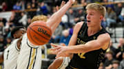 Mt. Vernon Marauders guard Luke Ertel (12) passes the ball 