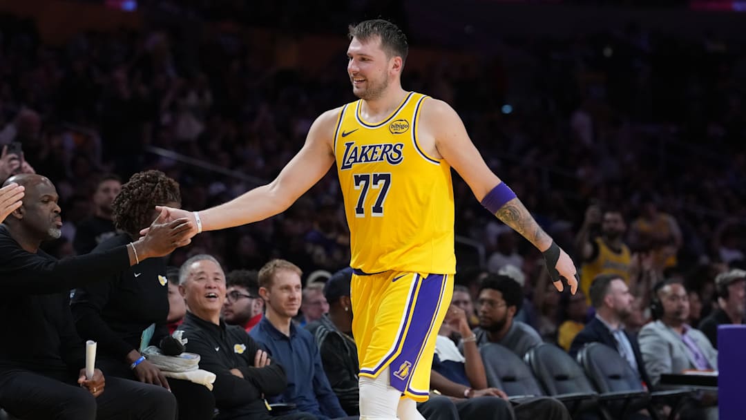 Oct 24, 2025; Los Angeles, California, USA; Los Angeles Lakers guard Luka Doncic (77) returns to the be3nch in the fourth quarteragainst the Minnesota Timberwolves at Crypto.com Arena. Mandatory Credit: Kirby Lee-Imagn Images