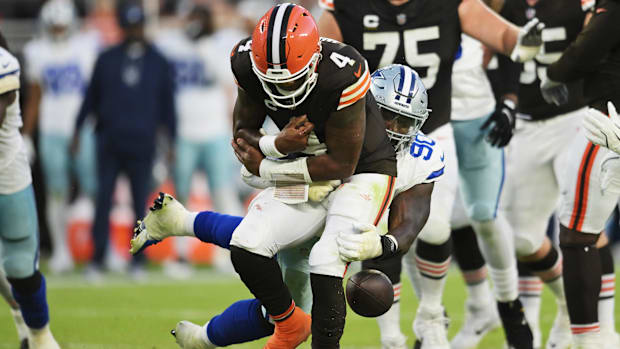 Dallas Cowboys defensive end DeMarcus Lawrence forces a fumble on Cleveland Browns quarterback Deshaun Watson 