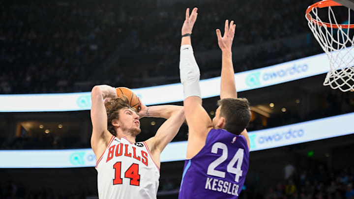 Utah Jazz center Walker Kessler contesting a dunk
