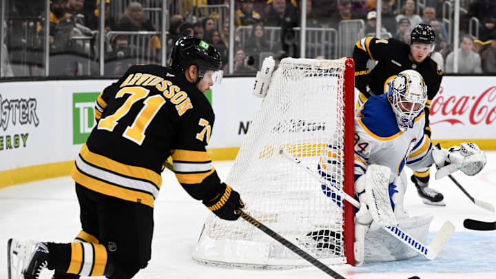 Apr 23, 2026; Boston, Massachusetts, USA; Boston Bruins left wing Viktor Arvidsson (71) attempts a shot on Buffalo Sabres goaltender Alex Lyon (34) during the first period of game three of the first round of the 2026 Stanley Cup Playoffs at the TD Garden. Mandatory Credit: Brian Fluharty-Imagn Images
