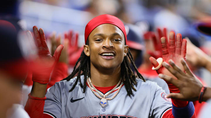 Washington Nationals shortstop CJ Abrams celebrates with teammates after hitting a home run against the Miami Marlins