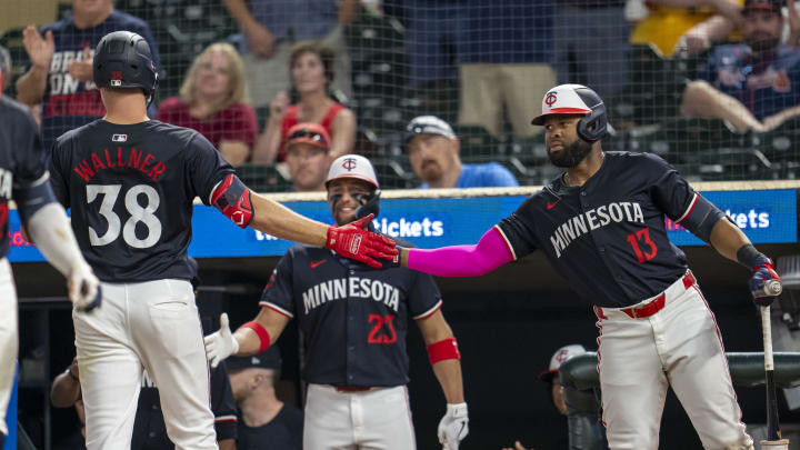 Aug 26, 2024; Minneapolis, Minnesota, USA; Minnesota Twins right fielder Matt Wallner (38) celebrates with left fielder Manuel Margot (13) after hitting a solo home run against the Atlanta Braves in the ninth inning at Target Field. Mandatory Credit: Jesse Johnson-USA TODAY Sports