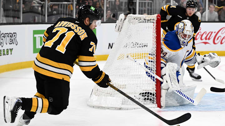 Apr 23, 2026; Boston, Massachusetts, USA; Boston Bruins left wing Viktor Arvidsson (71) attempts a shot on Buffalo Sabres goaltender Alex Lyon (34) during the first period of game three of the first round of the 2026 Stanley Cup Playoffs at the TD Garden. Mandatory Credit: Brian Fluharty-Imagn Images