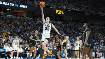 Mar 30, 2024; Albany, NY, USA;  Iowa Hawkeyes guard Caitlin Clark (22) shoots the ball past Colorado in the Sweet 16 of the NCAA Women's Tournament.
