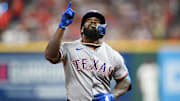 Texas Rangers designated hitter Adolis Garcia (53) rounds the bases after hitting a home run against the Cleveland Guardians during the fourth inning at Progressive Field.