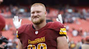 Sep 21, 2025; Landover, Maryland, USA; Washington Commanders center Tyler Biadasz (63) walks off the field after the game against the Las Vegas Raiders at Northwest Stadium. Mandatory Credit: Amber Searls-Imagn Images