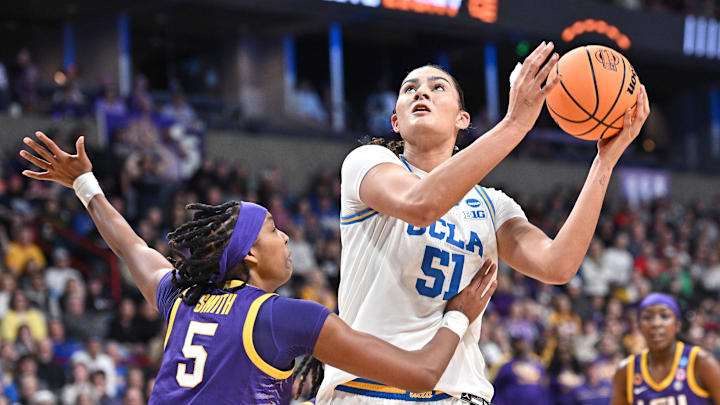 Mar 30, 2025; Spokane, WA, USA; UCLA Bruins center Lauren Betts (51) shoots against LSU Lady Tigers forward Sa'Myah Smith (5) during the second half of a Elite 8 NCAA Tournament basketball game at Spokane Arena. Mandatory Credit: James Snook-Imagn Images