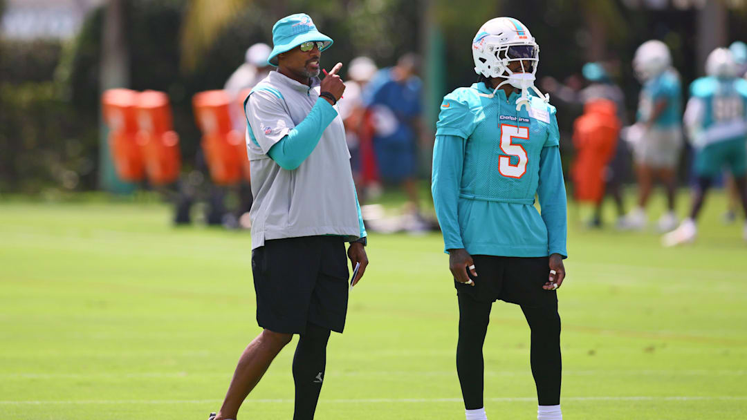 Miami Dolphins defensive coordinator Anthony Weaver talks to cornerback Jalen Ramsey (5) during mandatory minicamp at Baptist Health Training Complex.