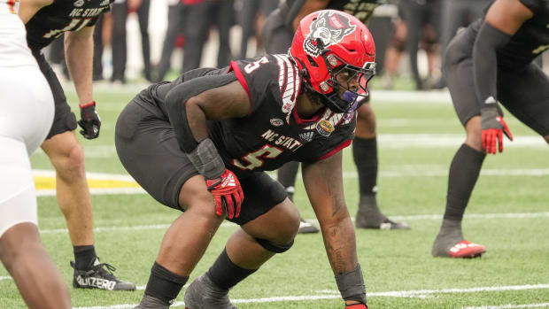 North Carolina State Wolfpack defensive tackle C.J. Clark (5) in his stance during the second half against the Maryland Terra