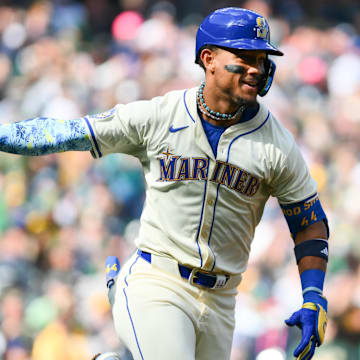 Sep 29, 2024; Seattle, Washington, USA; Seattle Mariners center fielder Julio Rodriguez (44) celebrates after hitting an RBI single against the Oakland Athletics during the fifth inning at T-Mobile Park. Mandatory Credit: Steven Bisig-Imagn Images
