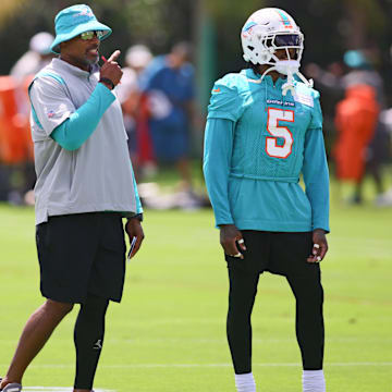 Miami Dolphins defensive coordinator Anthony Weaver talks to cornerback Jalen Ramsey (5) during mandatory minicamp at Baptist Health Training Complex.