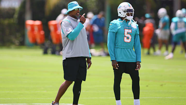 Miami Dolphins defensive coordinator Anthony Weaver talks to cornerback Jalen Ramsey (5) during mandatory minicamp at Baptist Health Training Complex.