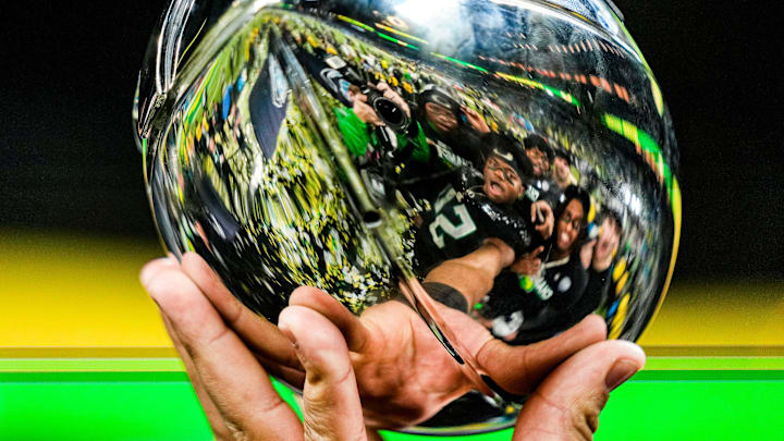 Oregon claimed the Big Ten championship and the No. 1 seed in the College Football Playoff. Oregon claimed the Big Ten championship and the No. 1 seed in the College Football Playoff.