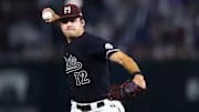 Mississippi State Bulldogs pitcher Evan Siary delivers to the plate in a game against the Ole Miss Rebels at Dudy Noble Field in Starkville, Miss.