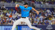 Jul 21, 2024; Miami, Florida, USA; Miami Marlins starting pitcher Trevor Rogers (28) delivers a pitch against the New York Mets during the first inning at loanDepot Park. 
