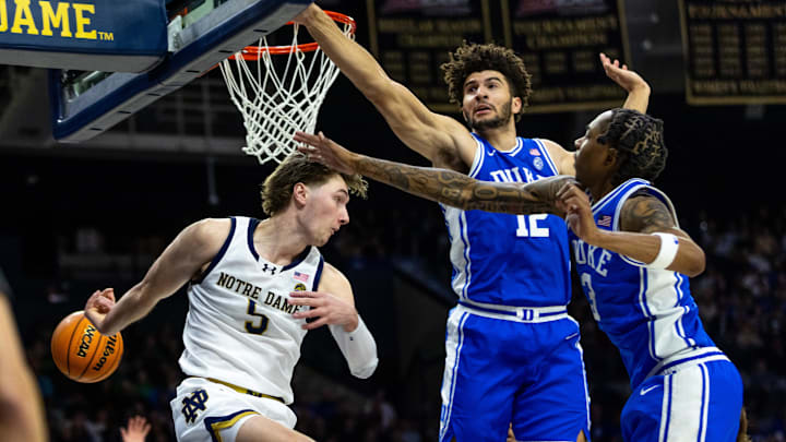 Duke Blue Devils forward Cameron Boozer (12) and guard Sebastian Wilkins (5) 