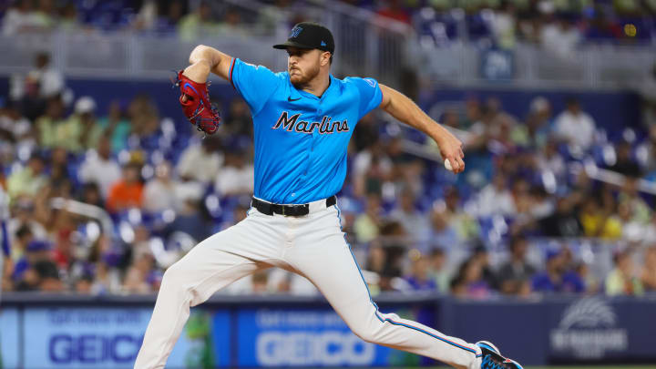 Jul 21, 2024; Miami, Florida, USA; Miami Marlins starting pitcher Trevor Rogers (28) delivers a pitch against the New York Mets during the first inning at loanDepot Park. Mandatory Credit: Sam Navarro-USA TODAY Sports