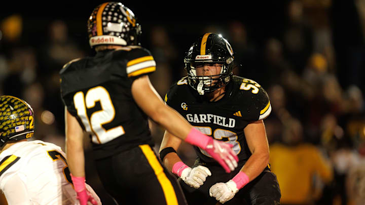 Garfield defenive lineman John Timmons flexes after sacking the Crestview quarterback during the game against Crestview High School Friday, October 17, 2025 in Garrettsville, OH.