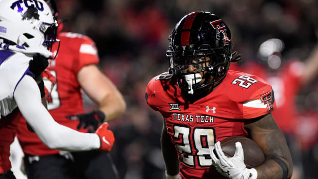 Texas Tech's running back Tahj Brooks (28) runs for a touchdown. Annie Rice/Avalanche-Journal / USA TODAY NETWORK