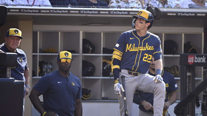 Jun 22, 2024; San Diego, California, USA; Milwaukee Brewers left fielder Christian Yelich (22) looks on from the dugout during the third inning against the San Diego Padres at Petco Park.