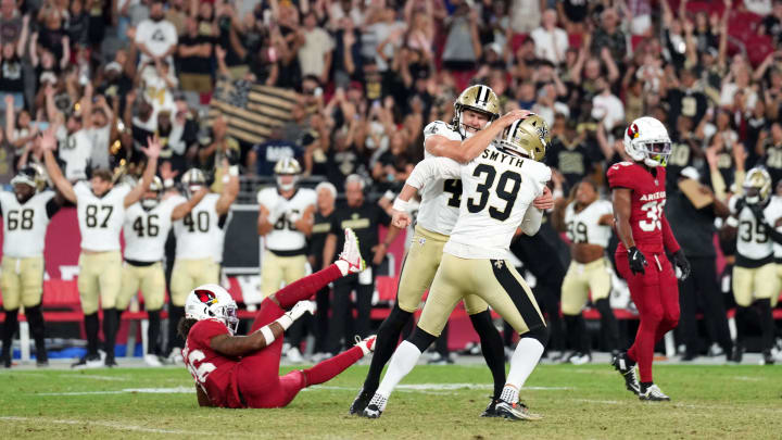 Aug 10, 2024; Glendale, Arizona, USA; New Orleans Saints place kicker Charlie Smyth (39) celebrates his game winning field goal with New Orleans Saints punter Matthew Hayball (43) against the Arizona Cardinals during the second half at State Farm Stadium. Mandatory Credit: Joe Camporeale-USA TODAY Sports