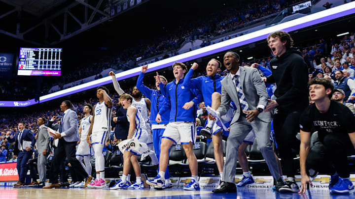 Dec 14, 2024; Lexington, Kentucky, USA; The Kentucky Wildcats bench celebrates after guard Otega Oweh (0) makes a basket during the second half against the Louisville Cardinals at Rupp Arena at Central Bank Center. Mandatory Credit: Jordan Prather-Imagn Images