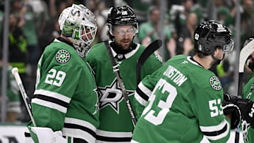 May 11, 2025; Dallas, Texas, USA; Dallas Stars goaltender Jake Oettinger (29) and defenseman Alexander Petrovic (28) celebrate the Stars win over the Winnipeg Jets in game three of the second round of the 2025 Stanley Cup Playoffs at American Airlines Center. Mandatory Credit: Jerome Miron-Imagn Images