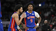 Feb 12, 2025; Chicago, Illinois, USA;  Detroit Pistons guard Cade Cunningham (2) and forward Ausar Thompson (9) chat against the Chicago Bulls during the second half at the United Center. Mandatory Credit: Matt Marton-Imagn Images