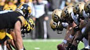 The line of scrimmage between the Iowa Hawkeyes and the Purdue Boilermakers