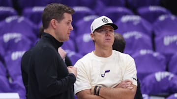 Oct 22, 2025; Salt Lake City, Utah, USA; Utah Jazz head coach Will Hardy (left) and Utah Jazz Owner Ryan Smith speak before the game against the Los Angeles Clippers at Delta Center. Mandatory Credit: Rob Gray-Imagn Images