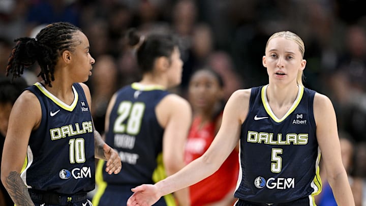 Jun 27, 2025; Dallas, Texas, USA; Dallas Wings guard Aziaha James (10) and guard Paige Bueckers (5) during the game between the Dallas Wings and the Indiana Fever at the American Airlines Center. Mandatory Credit: Jerome Miron-Imagn Images