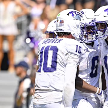 Sep 20, 2025; Fort Worth, Texas, USA; TCU Horned Frogs wide receiver Eric McAlister (1) celebrates with quarterback Josh Hoover (10) and running back Trent Battle (6) after McAlister scores a touchdown against the SMU Mustangs during the second half at Amon G. Carter Stadium. Mandatory Credit: Jerome Miron-Imagn Images