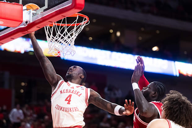 Nebraska Cornhuskers forward Juwan Gary (4) shoots the ball against Indiana Hoosiers center Oumar Ballo (11) during the first