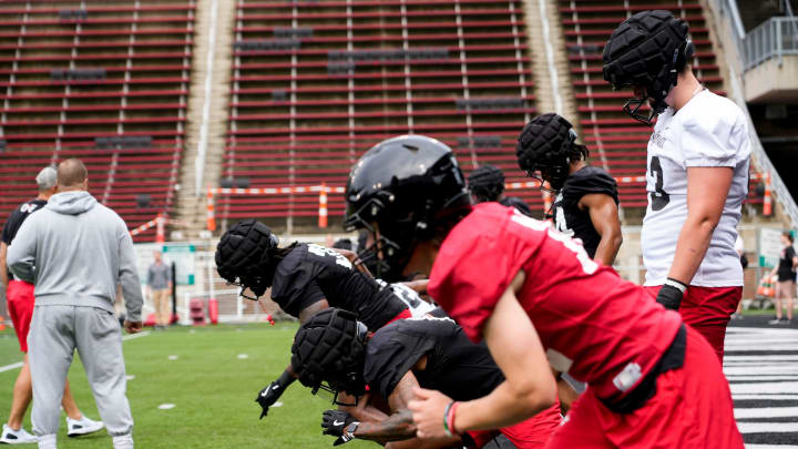 Cincinnati Bearcats players participate in drills during football practice, Wednesday, July 31, 2024, at Nippert Stadium in Cincinnati.