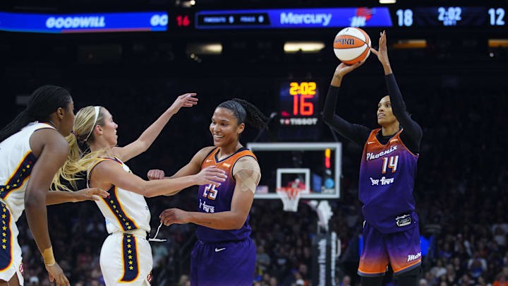 Mercury guard DeWanna Bonner (14) hits a three against the Fever at PHX Arena in Phoenix on Aug. 7, 2025. Mercury guard DeWanna Bonner (14) hits a three against the Fever at PHX Arena in Phoenix on Aug. 7, 2025.