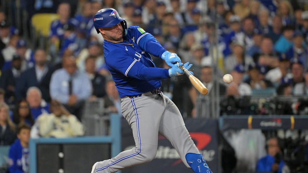 Oct 27, 2025; Los Angeles, California, USA; Toronto Blue Jays first baseman Ty France (2) hits a single against the Los Angeles Dodgers in the tenth inning during game three of the 2025 MLB World Series at Dodger Stadium. Mandatory Credit: Jayne Kamin-Oncea-Imagn Images Oct 27, 2025; Los Angeles, California, USA; Toronto Blue Jays first baseman Ty France (2) hits a single against the Los Angeles Dodgers in the tenth inning during game three of the 2025 MLB World Series at Dodger Stadium. Mandatory Credit: Jayne Kamin-Oncea-Imagn Images