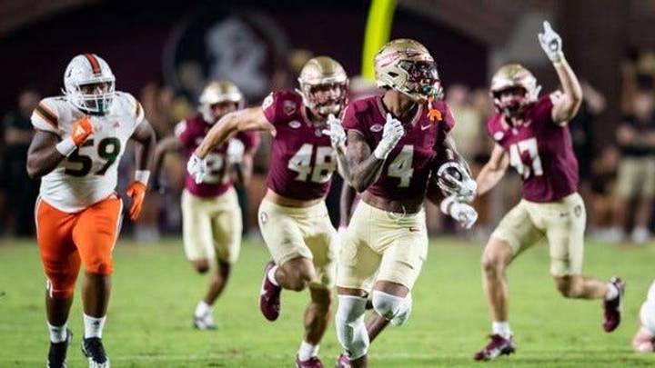 Seminoles wide receiver Keon Coleman sprints down the sideline in FSU's matchup with the Miami Hurricanes