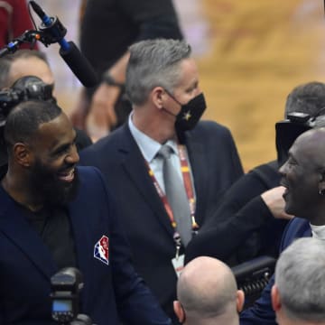 Feb 20, 2022; Cleveland, Ohio, USA; Lebron James and Michael Jordan on court during halftime during the 2022 NBA All-Star Game at Rocket Mortgage FieldHouse. Mandatory Credit: David Richard-USA TODAY Sports