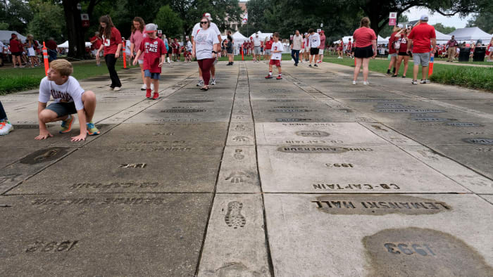 Alabama fans tour the Captains Plaza beside the Denny Chimes before Alabama faced Middle Tennessee