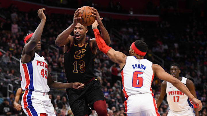 Jan 9, 2020; Detroit, Michigan, USA; Cleveland Cavaliers center Tristan Thompson (13) drives to the basket against Detroit Pistons forward Sekou Doumbouya (45) and guard Bruce Brown (6) during the fourth quarter at Little Caesars Arena. Mandatory Credit: Tim Fuller-Imagn Images