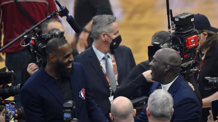 Feb 20, 2022; Cleveland, Ohio, USA; Lebron James and Michael Jordan on court during halftime during the 2022 NBA All-Star Game at Rocket Mortgage FieldHouse. Mandatory Credit: David Richard-USA TODAY Sports