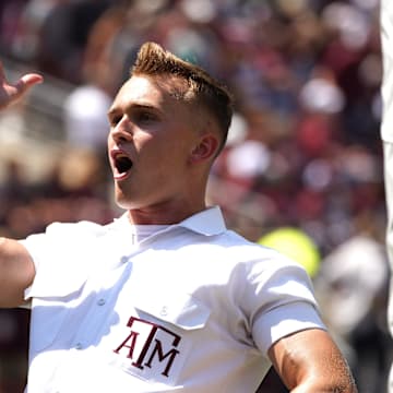 Sep 7, 2024; College Station, Texas, USA; A Texas A&M Aggies yell leader reacts during the fourth quarter against the McNeese State Cowboys at Kyle Field. 
