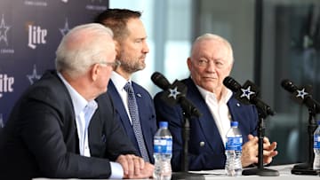 Jan 27, 2025; Frisco, TX, USA;   (L to R) Dallas Cowboys CEO Stephen Jones, head coach Brian Schottenheimer and owner Jerry Jones speak to the media at a press conference at the Star.  Mandatory Credit: Tim Heitman-Imagn Images