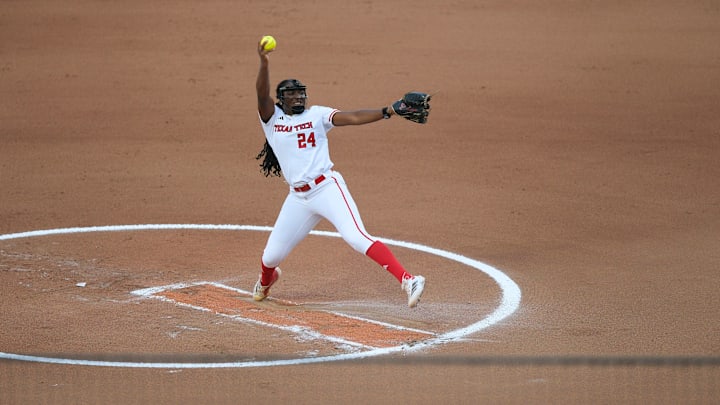 NiJaree Canady pitches during the Women's College World Series finals. NiJaree Canady pitches during the Women's College World Series finals.
