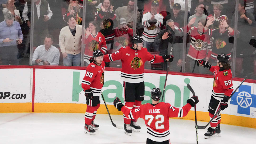 Apr 15, 2026; Chicago, Illinois, USA; Chicago Blackhawks defenseman Louis Crevier (46) celebrates his goal against the San Jose Sharks during the third period at United Center. Mandatory Credit: David Banks-Imagn Images
