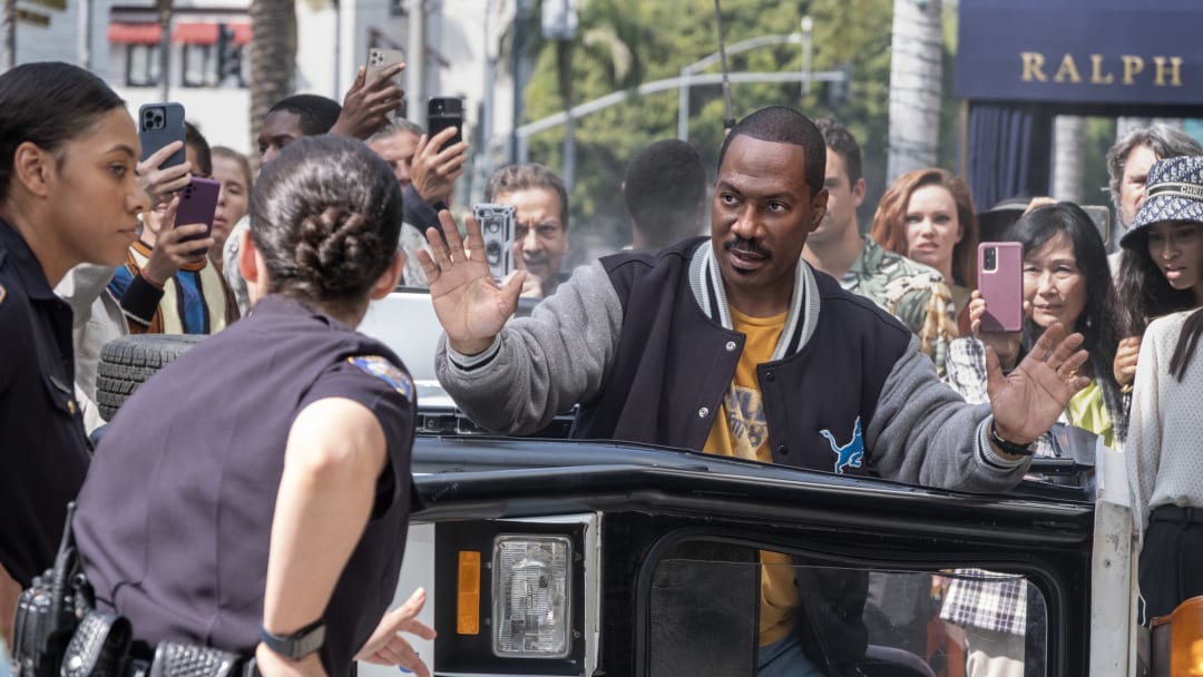 Beverly Hills Cop: Axel F. (Featured L-R) Bria Murphy as Officer Renee Minnick and Eddie Murphy as Axel Foley in Beverly Hills Cop: Axel F. Cr. Melinda Sue Gordon/Netflix ©2023.