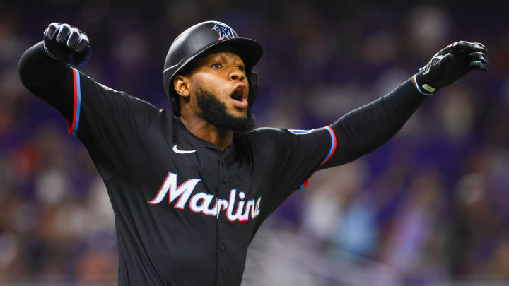 Jul 5, 2024; Miami, Florida, USA; Miami Marlins left fielder Bryan De La Cruz (14) reacts after hitting a fly ball to Chicago White Sox center fielder Luis Robert Jr. (not pictured) during the seventh inning at loanDepot Park. Mandatory Credit: Sam Navarro-USA TODAY Sports